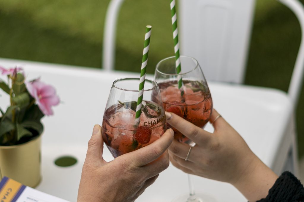 Two Glasses Clink Together At Skyline Sips Edinburgh